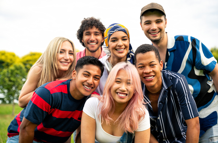 Group of multiethnic students spending time outdoors.